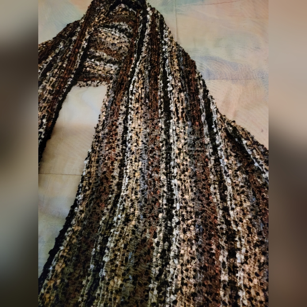 Variety of scarves was told they are handmade.